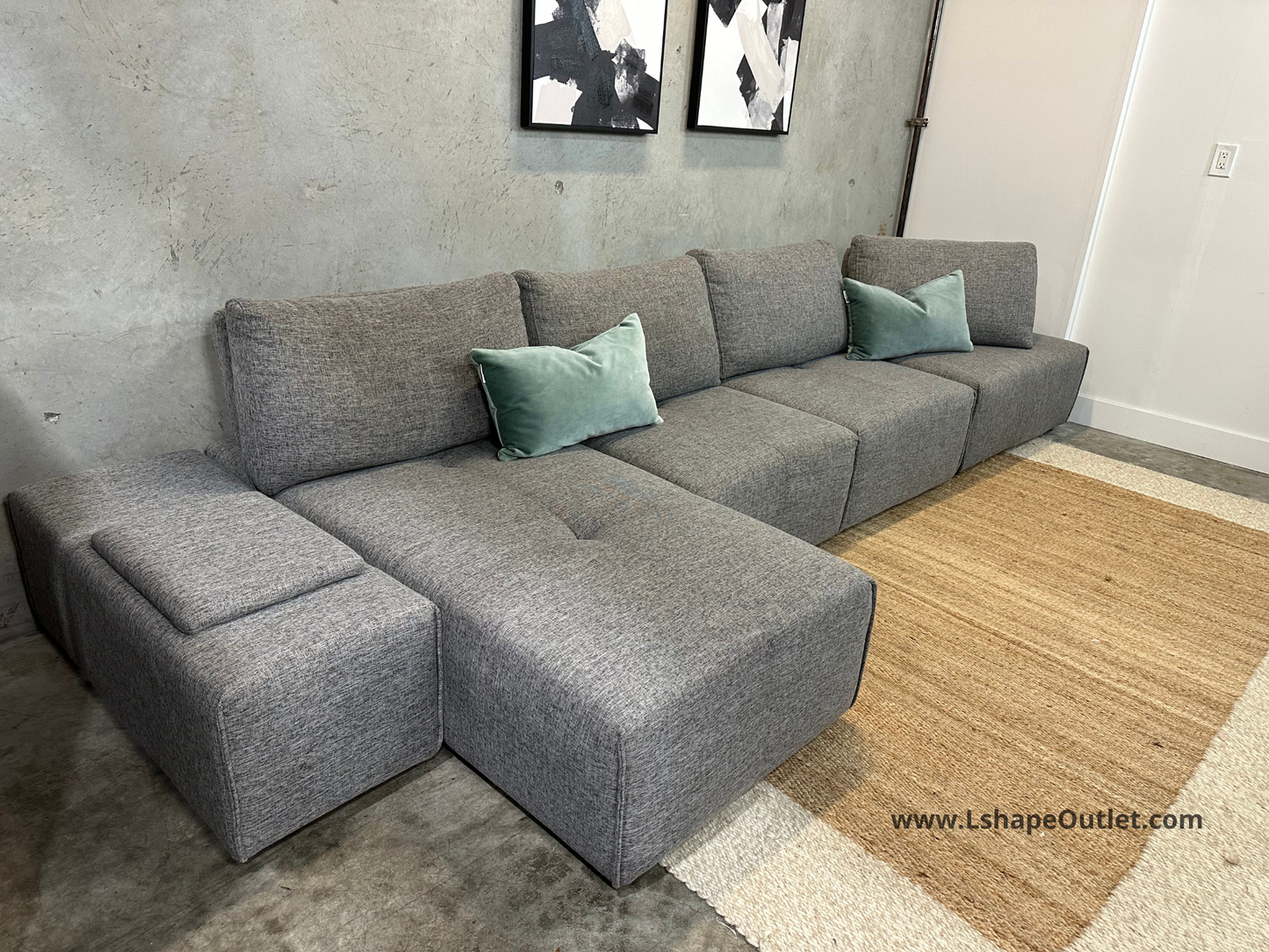 Modular sectional with charging panel