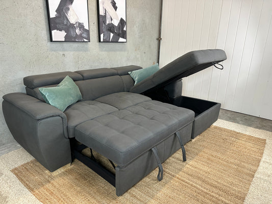 Grey Sofabed couch with adjustable headrests